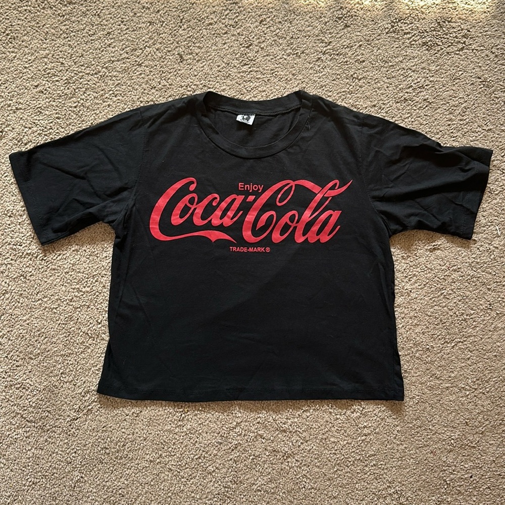 coca cola tshirt in black. no size but its a size small/medium
